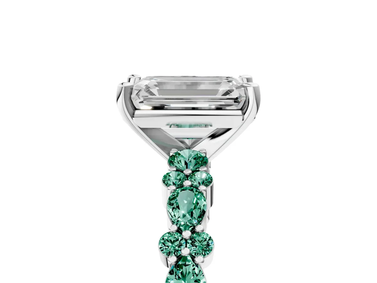 Emerald Cut Diamond Side Stone Solitaire Ring with Round Green Sapphire and Four-Prong Setting Platinum