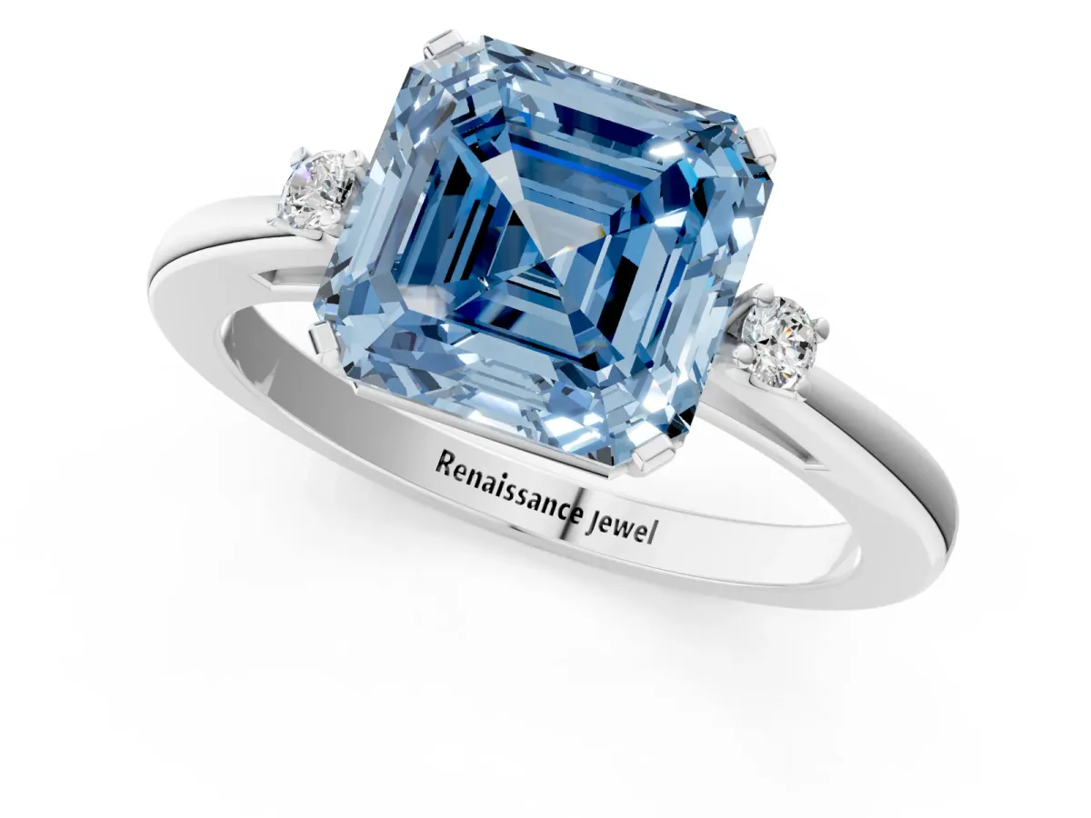 Fancy Blue Asscher Cut Cut Three-Stone Solitaire Ring with Round Accent Diamonds and Four-Prong Setting Platinum