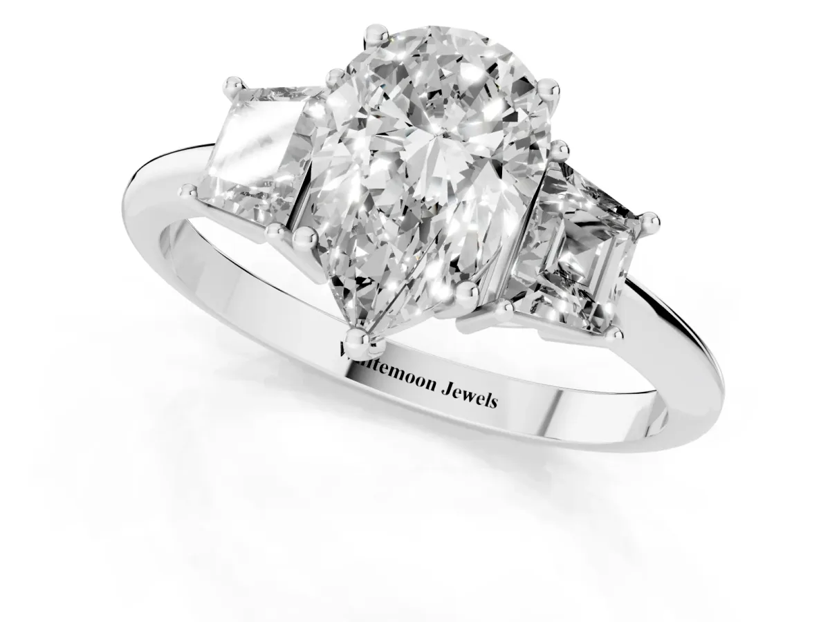 Pear Cut Diamond Three-Stone Ring with Trapezoid Side Stones and Prong Setting Platinum