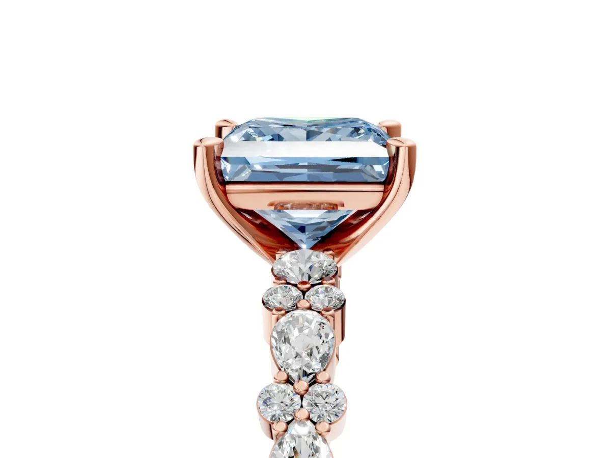 Fancy Blue Princess Cut Diamond Side Stone Solitaire Ring with Round and Four-Prong Setting Rose gold