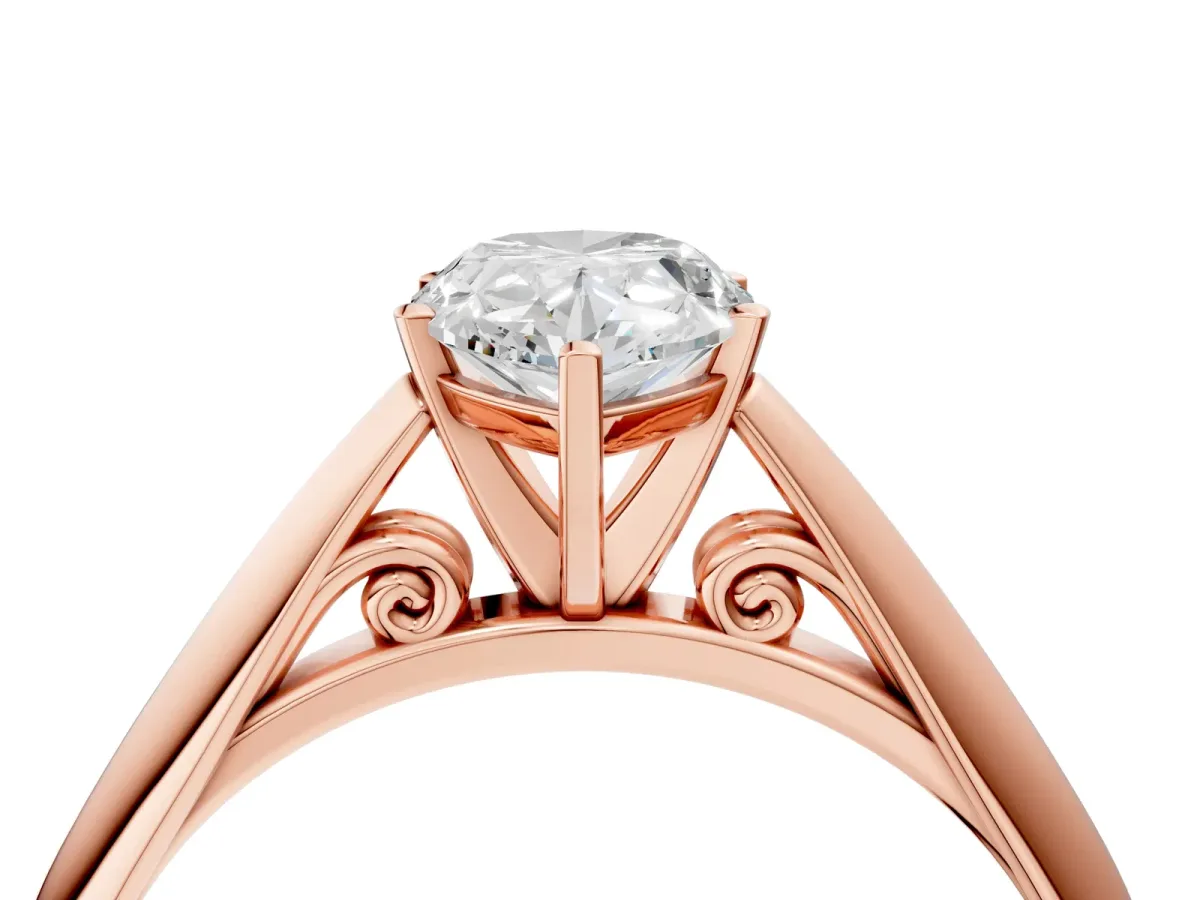 Pear Cut Diamond Solitaire Engagement Ring with Cathedral Setting and Four-Prong Mount Rose gold