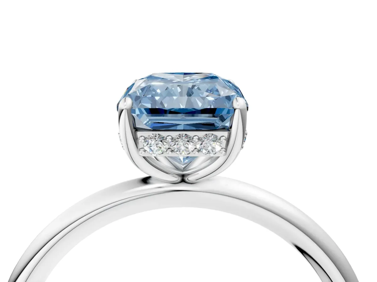 Fancy Blue Radiant Cut Solitaire Diamond Ring with a Classic Band and Four-Prong Setting Platinum