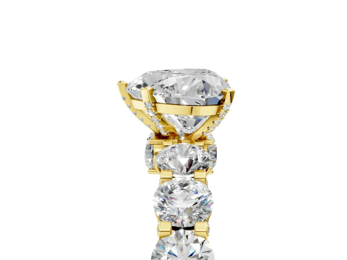 Heart Cut Diamond Side Stone Engagement Ring with Four-Prong Setting Yellow gold