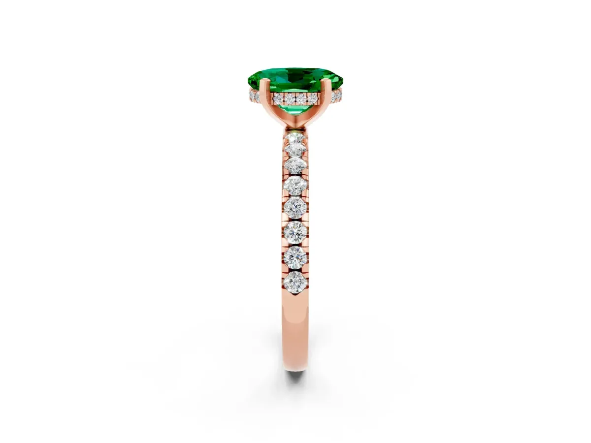 Oval Cut Emerald Solitaire Ring with Round Pavé Band and Four-Prong Setting Rose gold