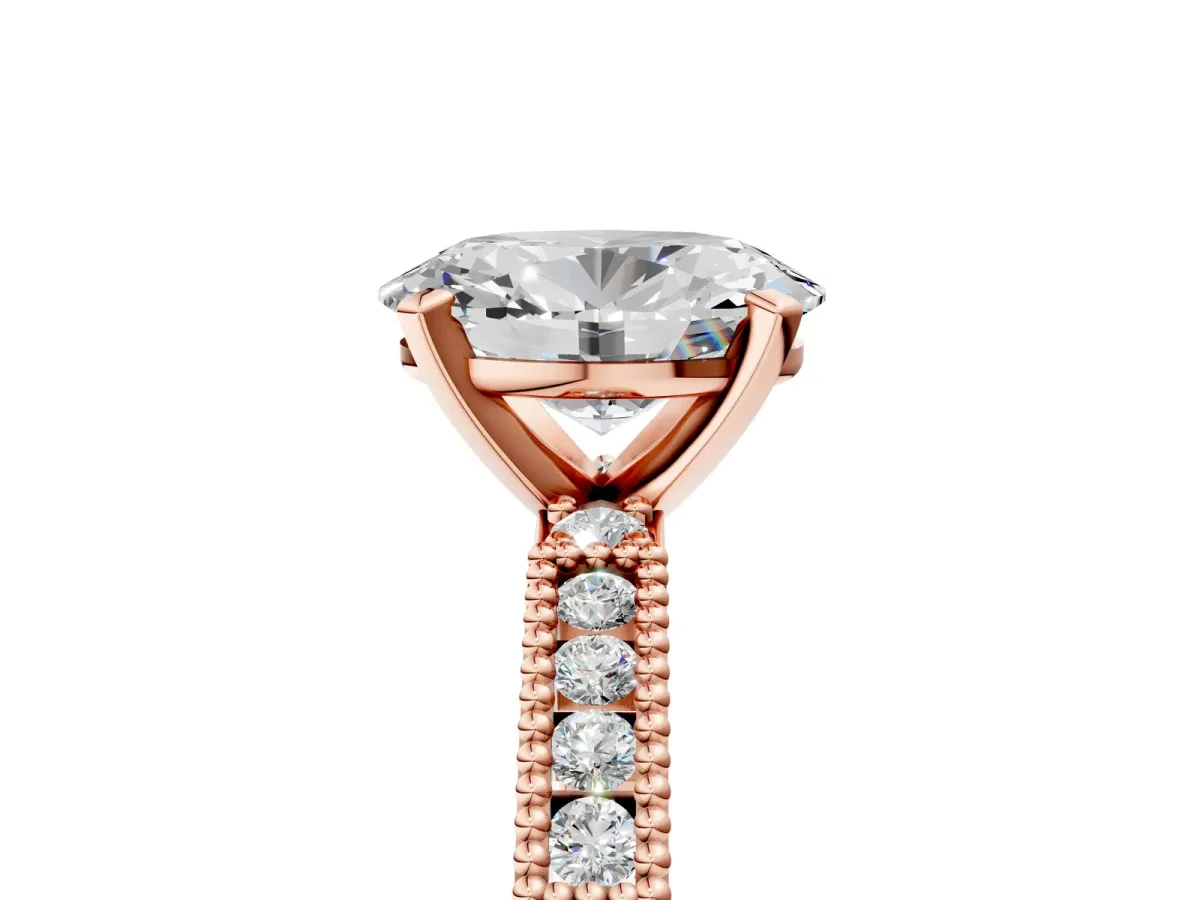 Oval Cut Solitaire with Pavé Band and Four-Prong Setting Rose gold