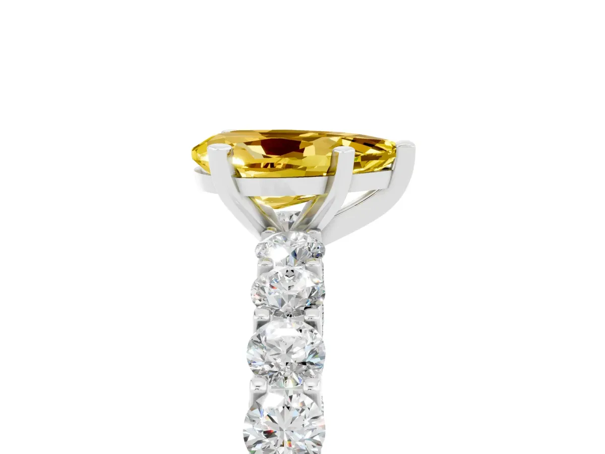 Pear Cut Yellow Sapphire Solitaire Ring with Shared Prong Pavé Band and Four-Prong Setting Silver