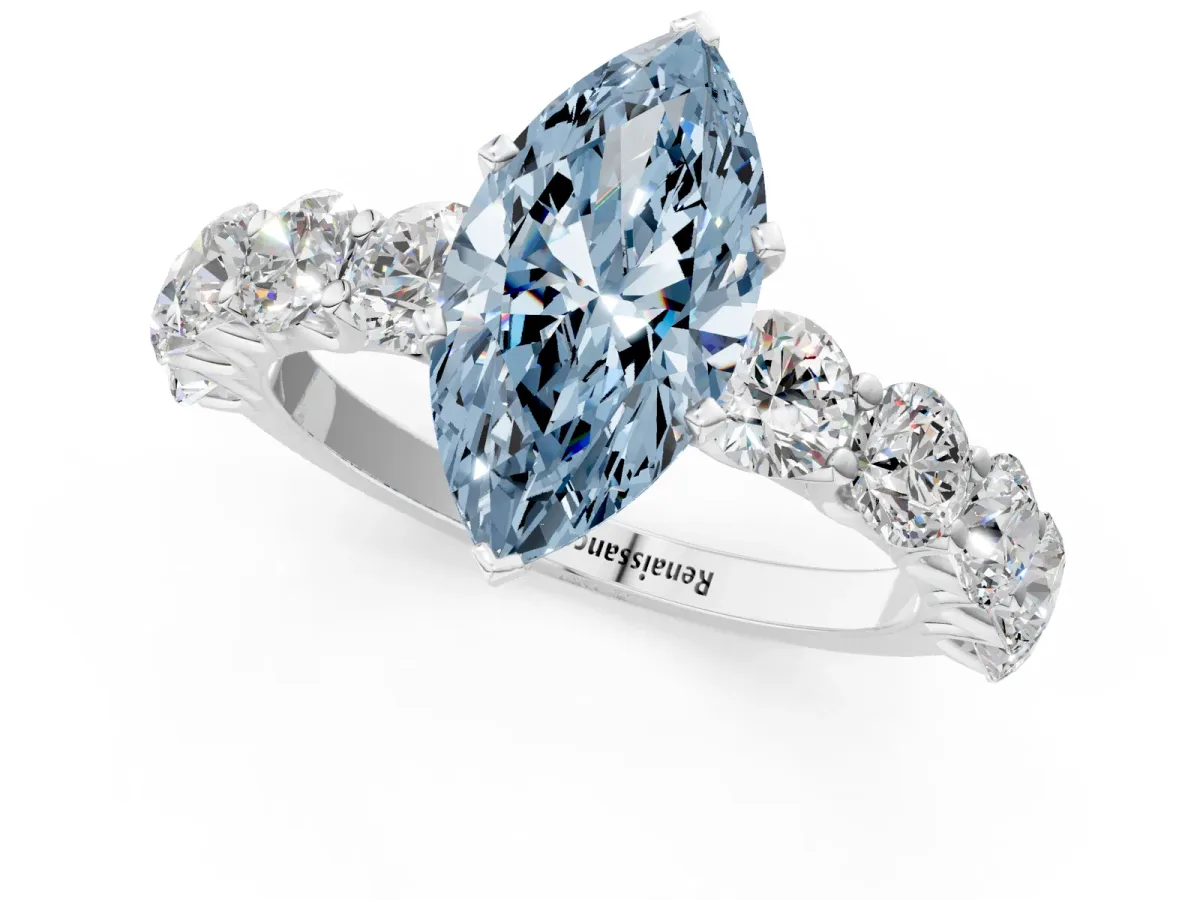 Fancy Blue Marquise Cut Diamond Prong Setting with Side Stones on a Pave Band Silver