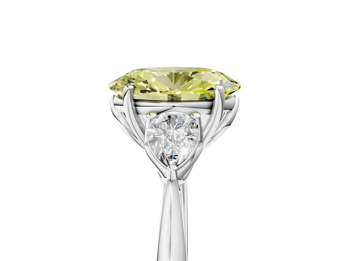 Fancy Yellow Three-Stone Oval Cut Diamond Ring with Pear Side Stones in Four-Prong Setting White gold