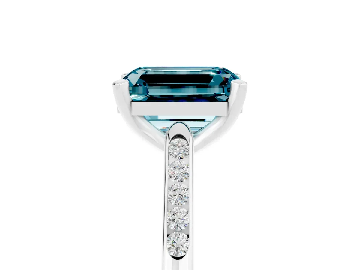 Emerald Cut Blue Topaz Solitaire Ring with Channel Set Round Band and Prong Setting Silver