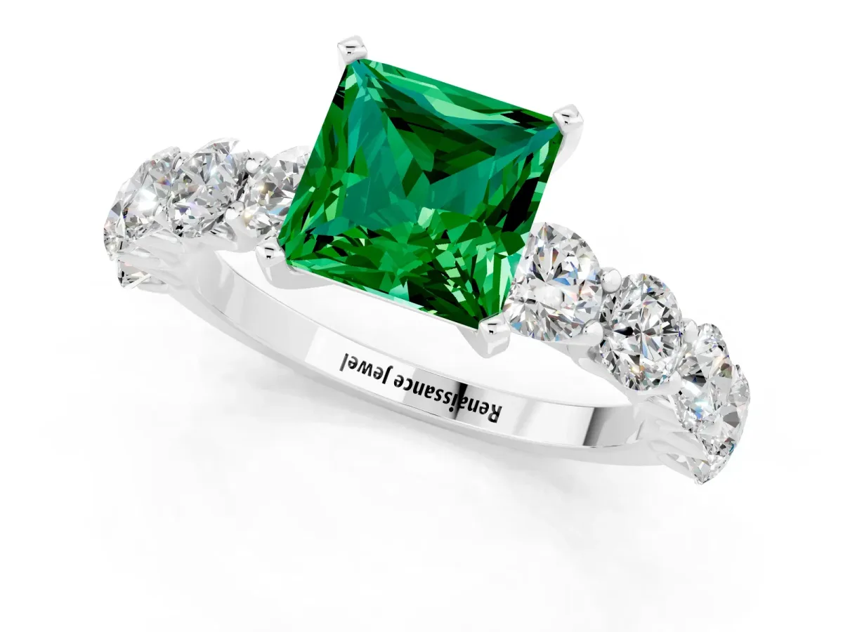 Princess Cut Emerald Prong Setting with Side Stones on a Pave Band Platinum