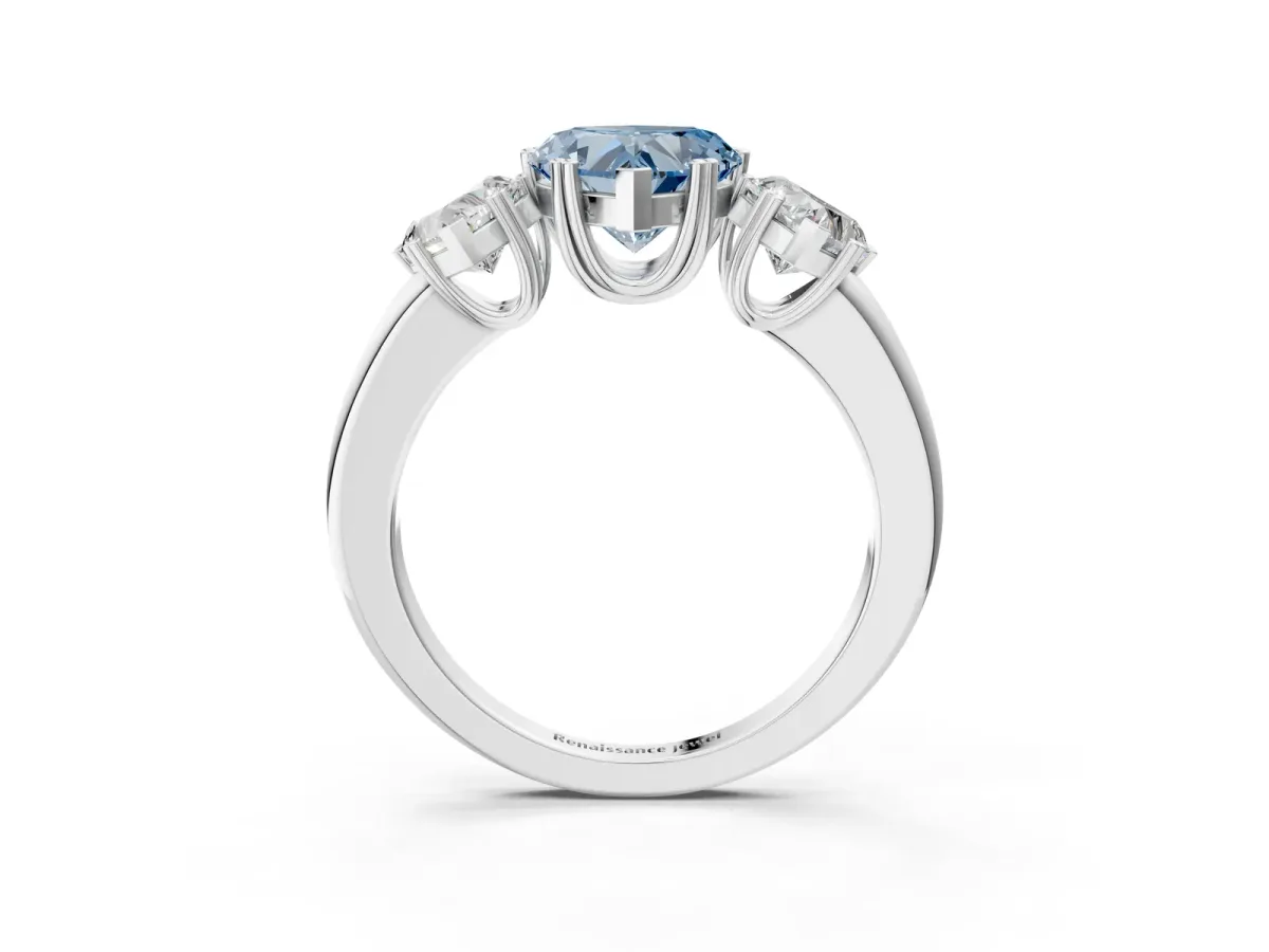 Fancy Blue Three-Stone Heart Cut Cut Diamond Ring with Channel Set Band and Four-Prong Setting Silver