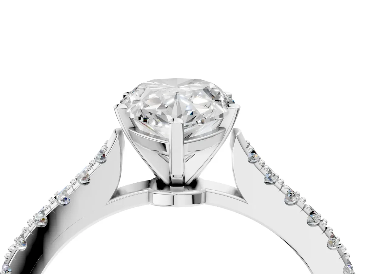 Pear Cut Cut Solitaire Diamond Engagement Ring with Pave Band and Four-Prong Setting Silver