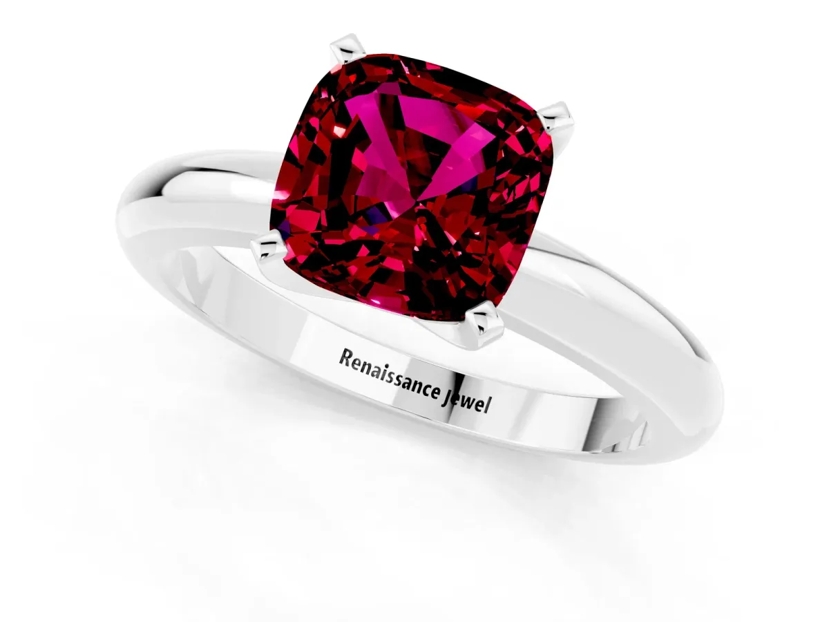 Cushion Cut Garnet Solitaire Engagement Ring with Round Band and Four-Prong Setting Silver