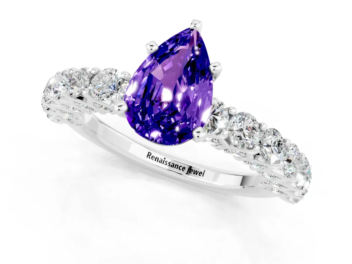 Pear Cut Tanzanite Solitaire Ring with Shared Prong Pavé Band and Four-Prong Setting Silver