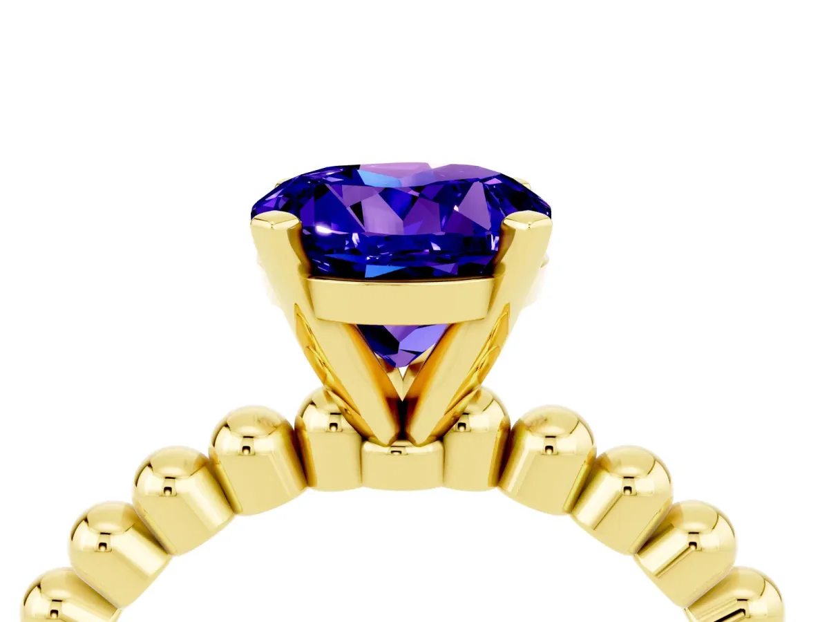 Round Cut Tanzanite Solitaire Ring with Beaded Band and Prong Setting Yellow gold