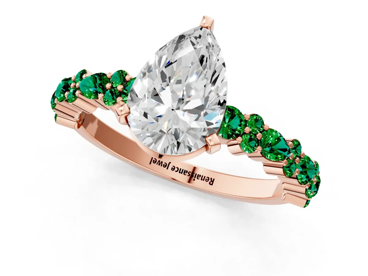 Pear Cut Diamond Side Stone Solitaire Ring with Round Emerald and Four-Prong Setting Rose gold