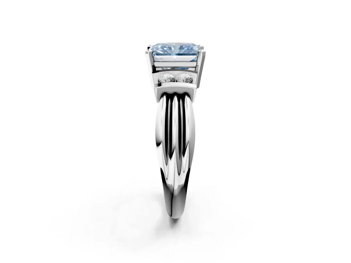 Fancy Blue Radiant Cut Cut Three-Stone Channel Set Ring with Bar Prongs Platinum