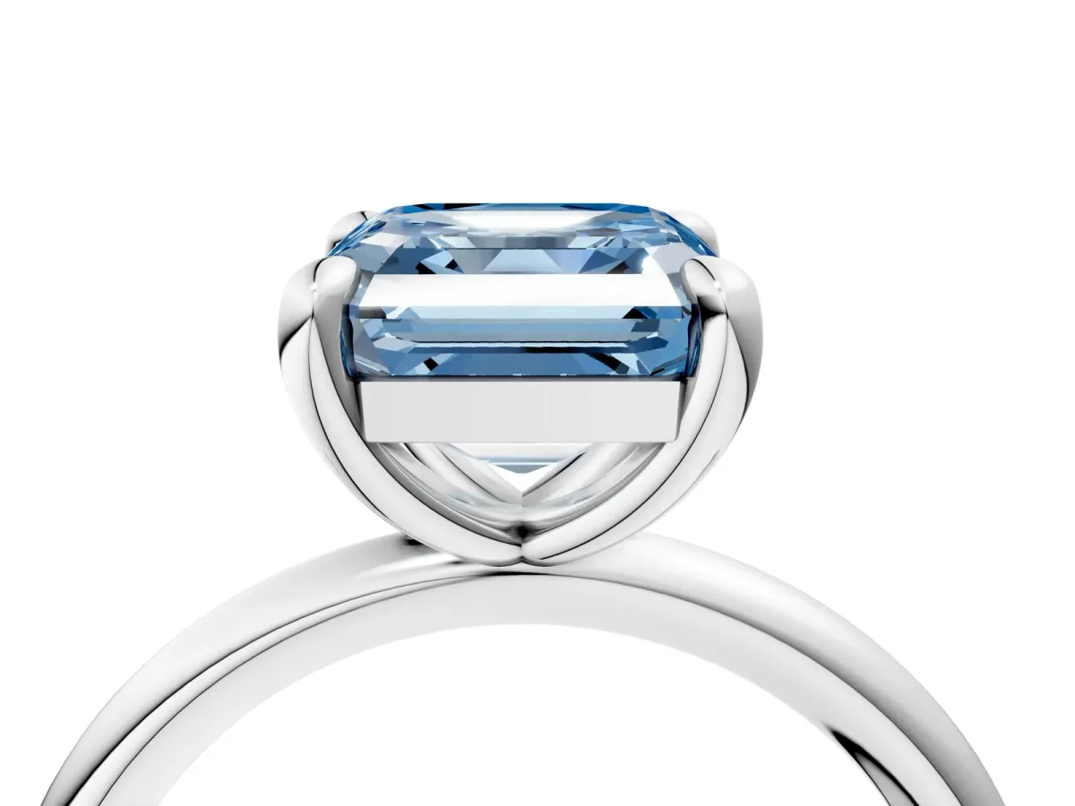 Fancy Blue Asscher Cut Solitaire Diamond Ring with Four-Prong Setting on a Plain Band Platinum