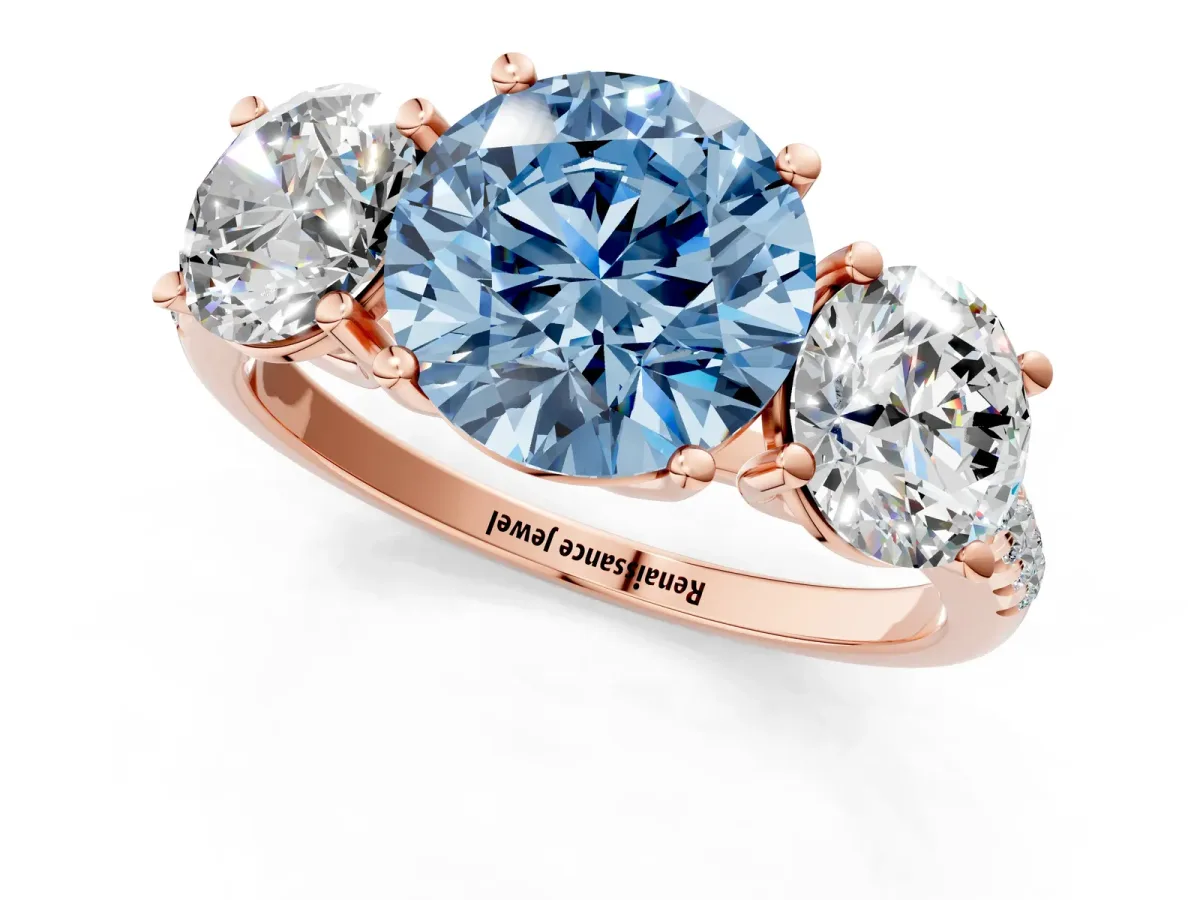 Fancy Blue Three-Stone Round Cut Diamond Ring with Round Pavé Band and Prong Setting Rose gold