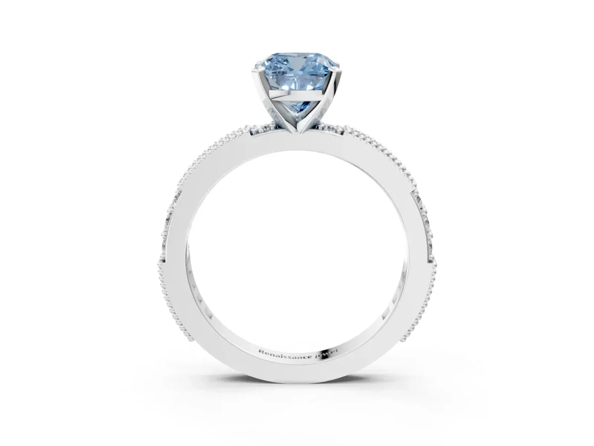 Fancy Blue Cushion Cut Solitaire with Pavé Band and Four-Prong Setting Silver