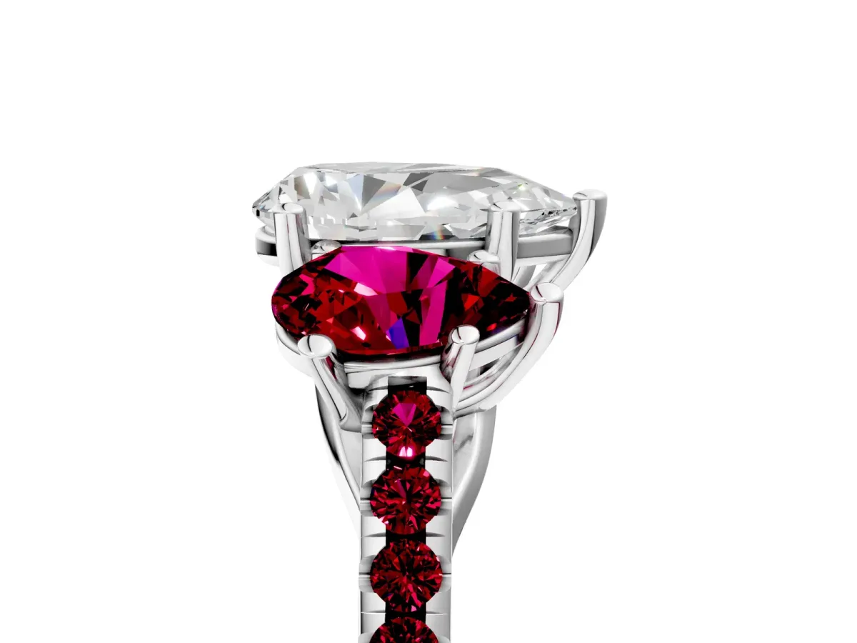 Three-Stone Pear Cut Diamond Ring with Round Garnet Pavé Band and Prong Setting Platinum