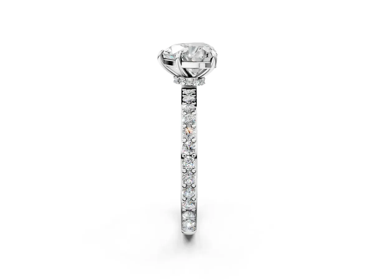 Heart Cut Diamond Solitaire Engagement Ring with Pavé Band and Four-Prong Setting Silver
