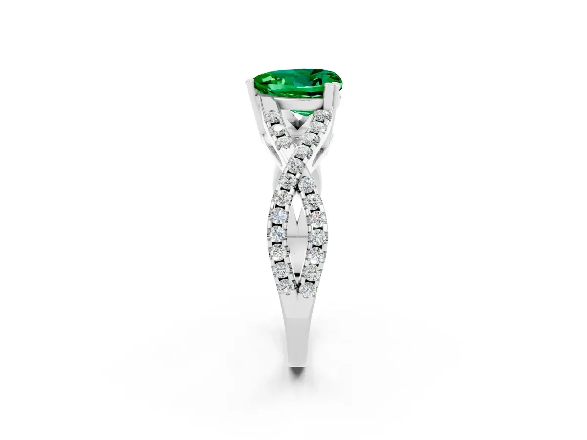 Heart Cut Emerald Solitaire Ring with Four-Prong Setting and Twisted Pavé Band Silver