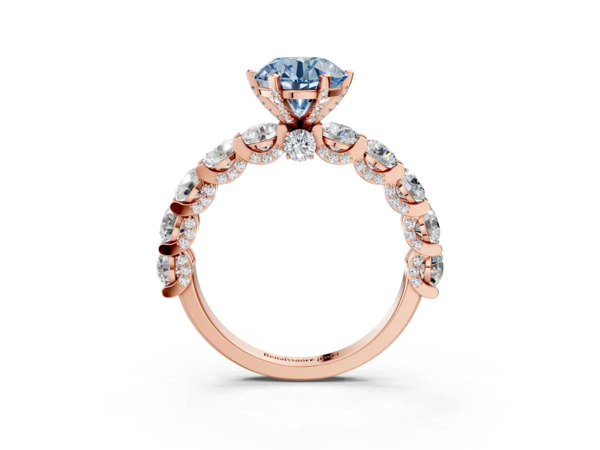 Fancy Blue Round Cut Diamond Side Stone Engagement Ring with Four-Prong Setting Rose gold