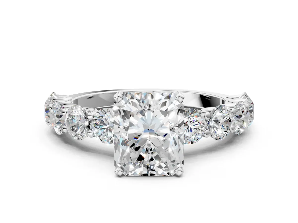 Radiant Cut Diamond Prong Setting with Side Stones on a Pave Band Silver