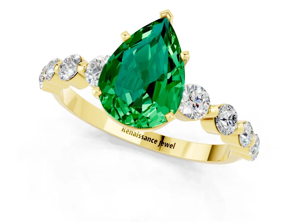 Pear Cut Solitaire Emerald Ring with Pave Band and Four-Prong Setting Yellow gold
