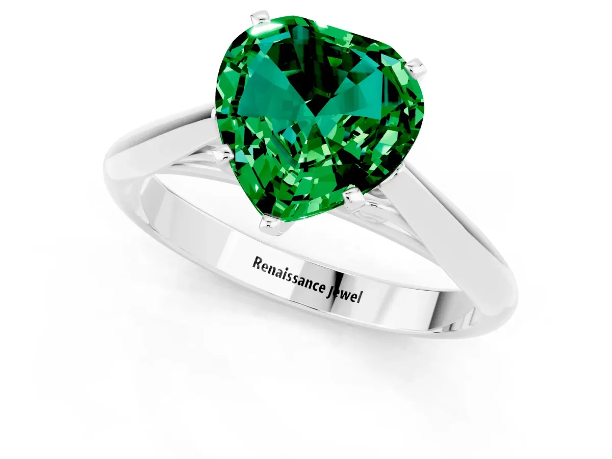 Heart Cut Emerald Solitaire Engagement Ring with Cathedral Setting and Four-Prong Mount White gold