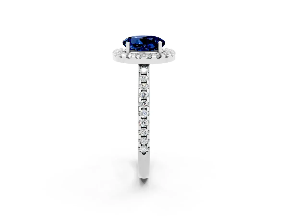 Round Cut Blue Sapphire Pavé Halo Ring with Four-Prong Setting Platinum