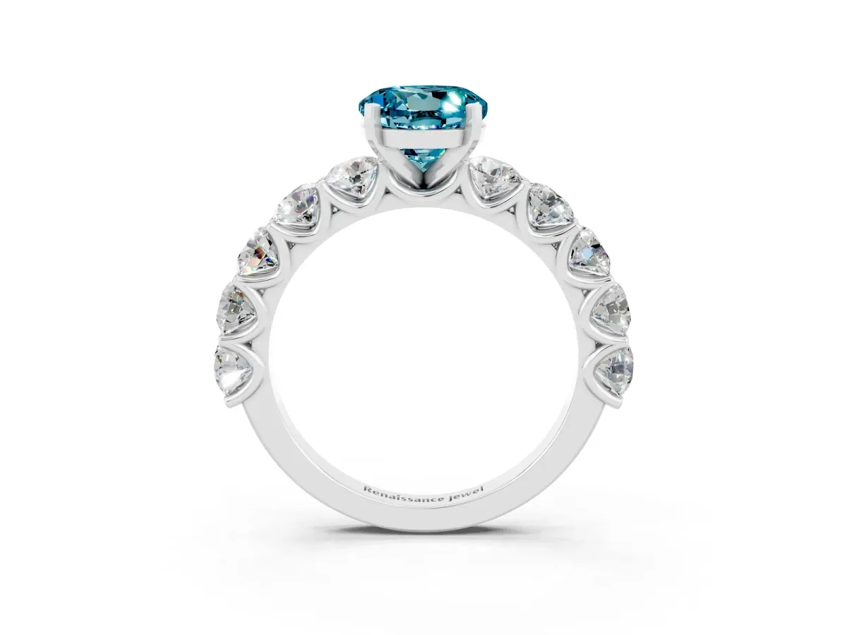 Round Cut Blue Topaz Prong Setting with Side Stones on a Pave Band Silver
