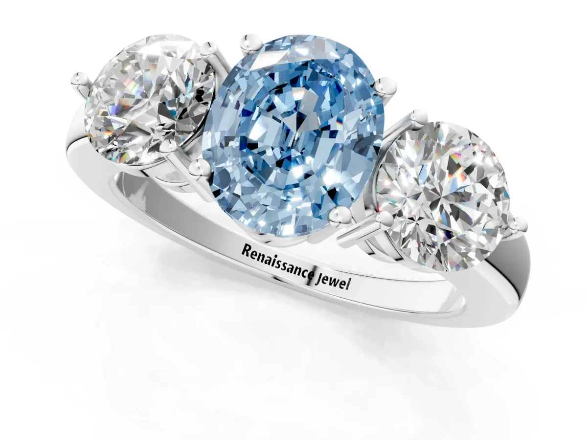 Fancy Blue Oval Cut Diamond Three-Stone Ring with Prong Setting and Classic Band White gold