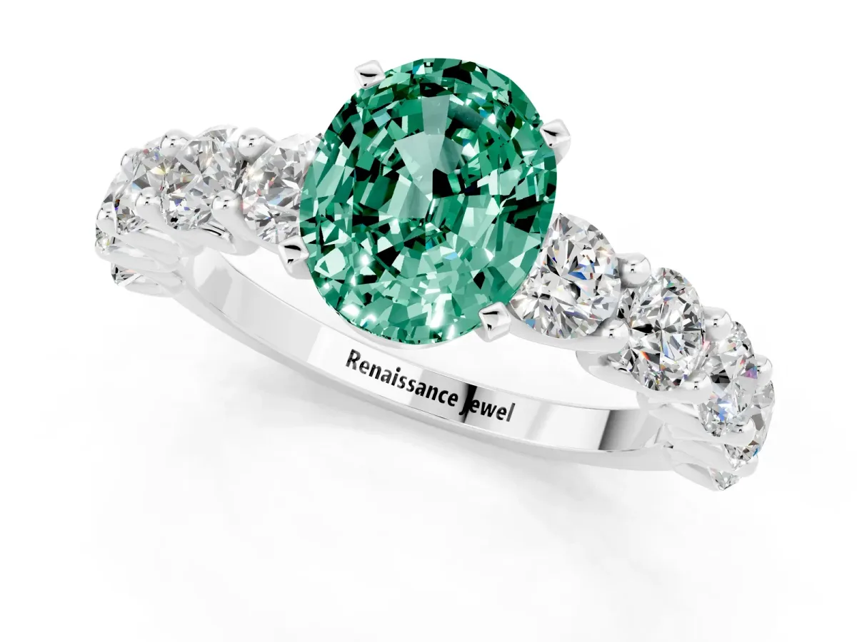 Oval Cut Green Sapphire Prong Setting with Side Stones on a Pave Band Platinum