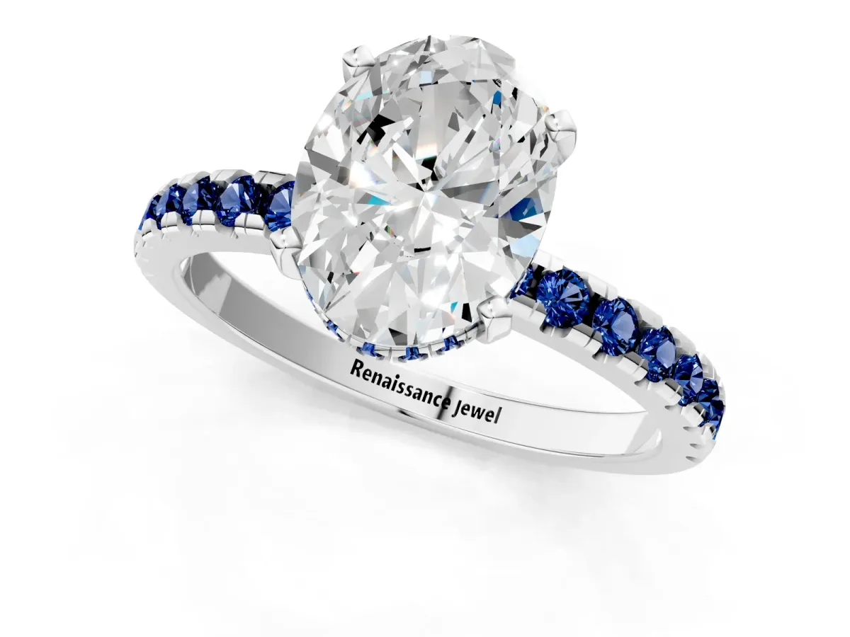 Oval Cut Diamond Solitaire Ring with Round Blue Sapphire Pavé Band and Four-Prong Setting Silver