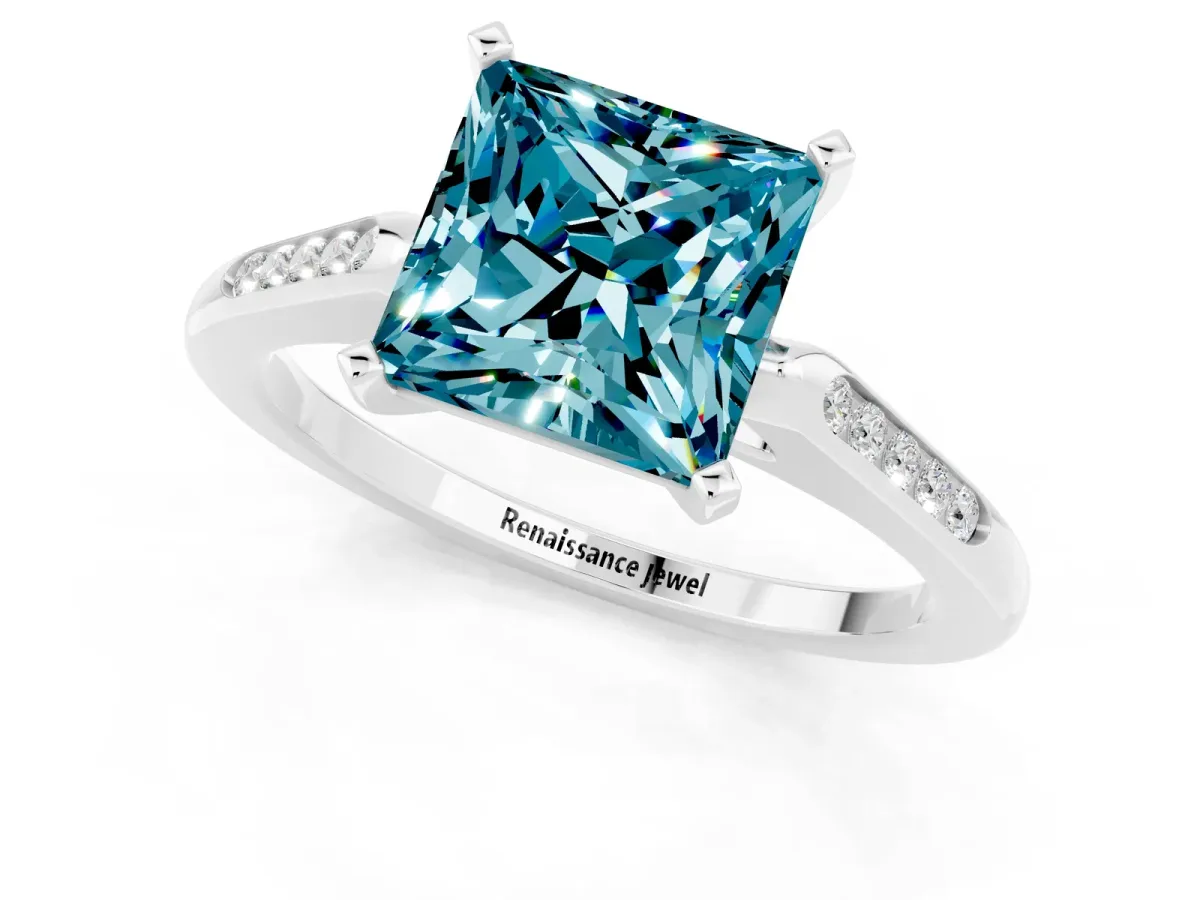 Princess Cut Blue Topaz Solitaire Ring with Channel Set Round Band and Prong Setting Silver
