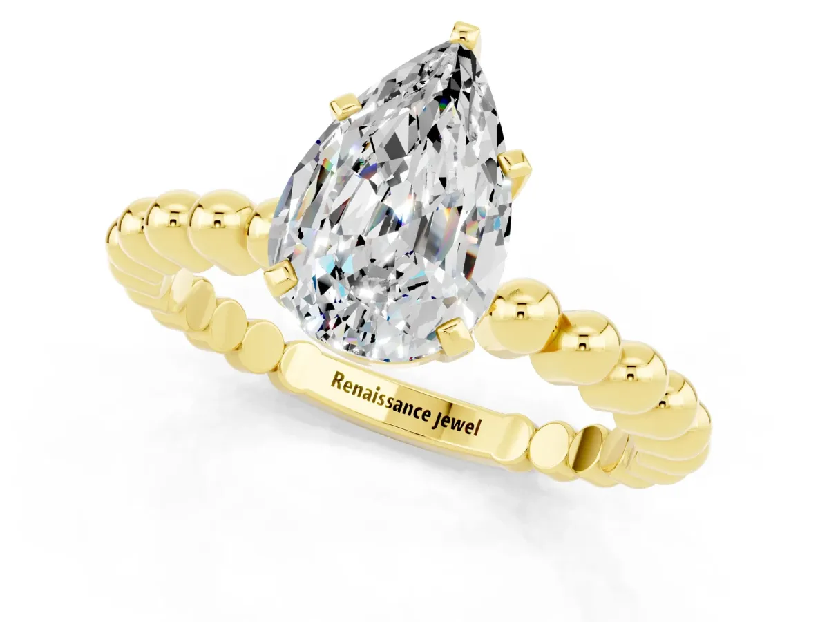 Pear Cut Moissanite Solitaire Ring with Beaded Band and Prong Setting Yellow gold