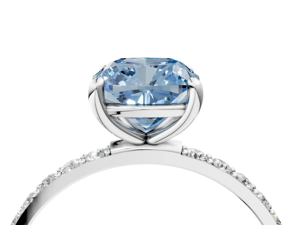 Fancy Blue Cushion Cut Diamond Solitaire Ring with Round Pavé Band and Prong Setting Platinum