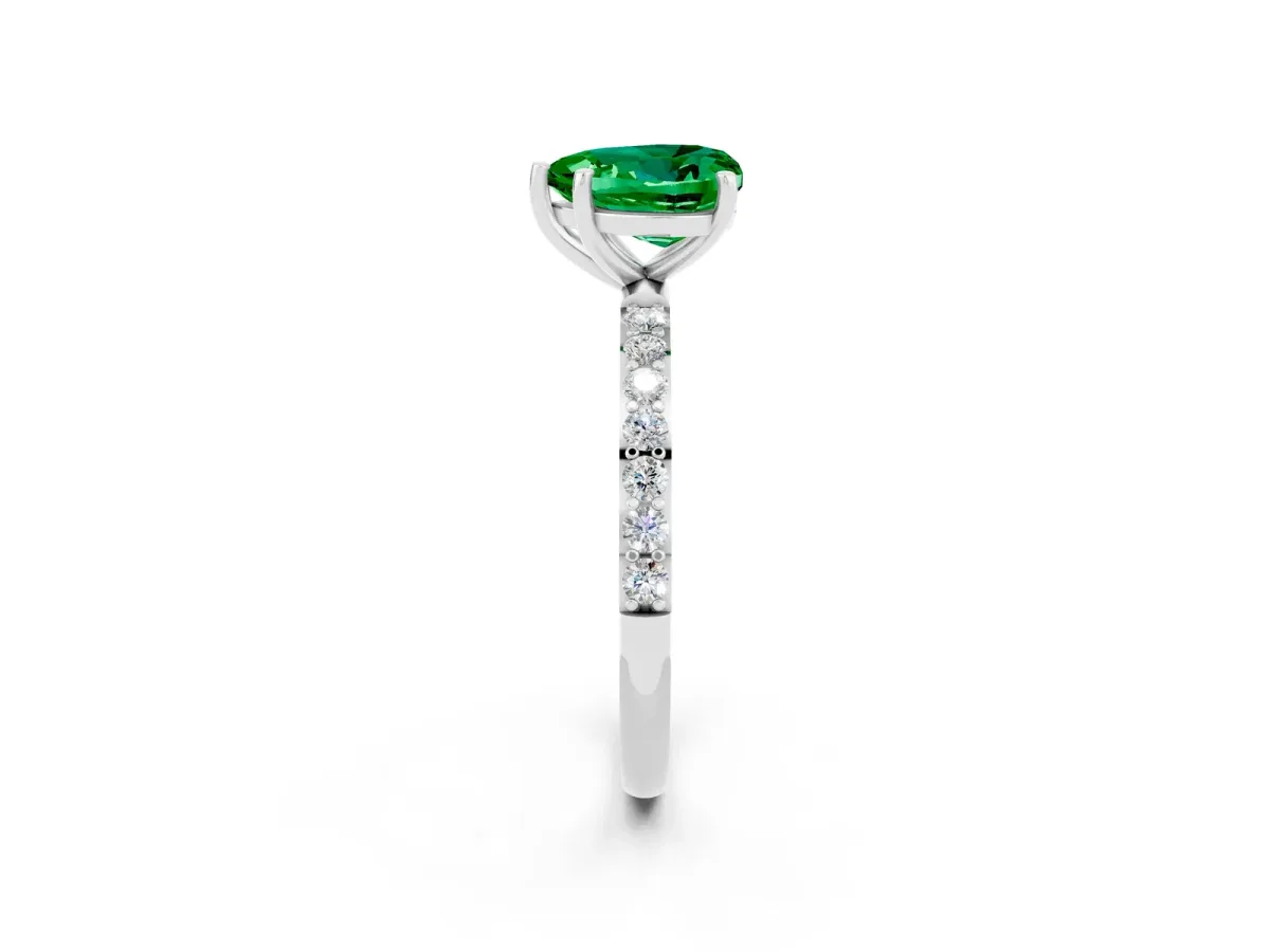 Heart Cut Emerald Solitaire Ring with Round Pavé Band and Prong Setting Silver