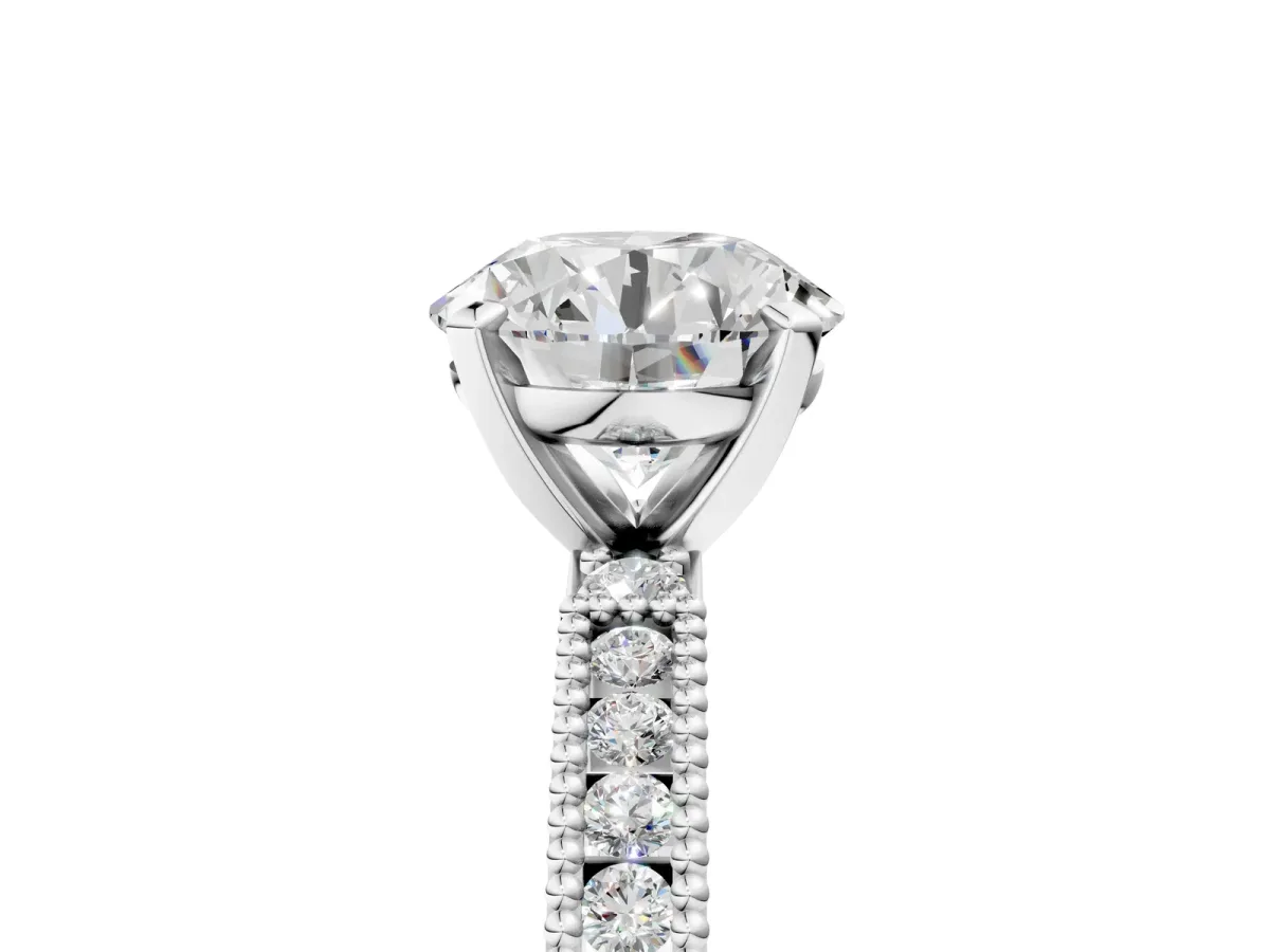 Round Cut Solitaire with Pavé Band and Four-Prong Setting Platinum