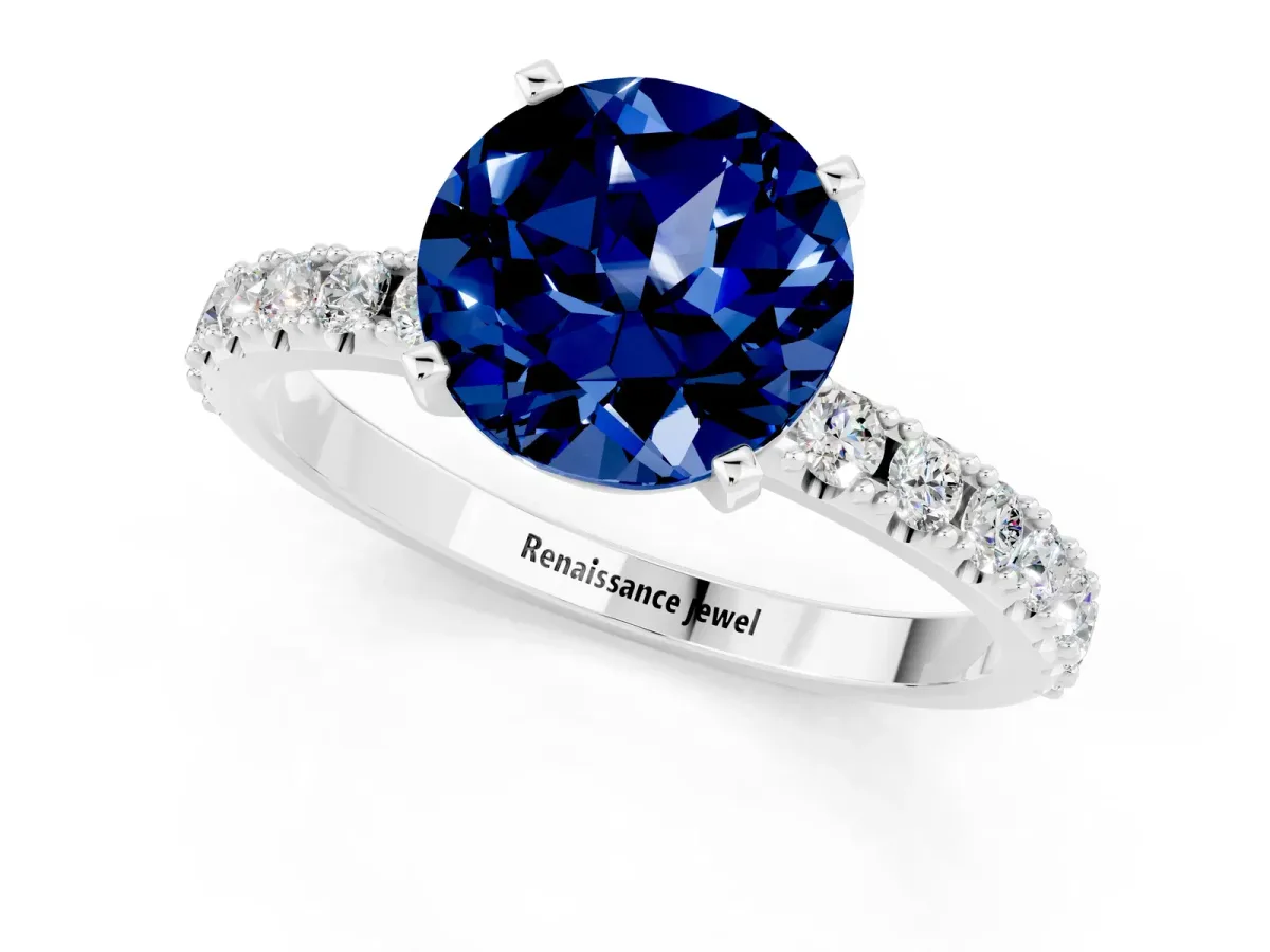 Round Cut Blue Sapphire Solitaire Pavé Band with Four-Prong Setting Platinum