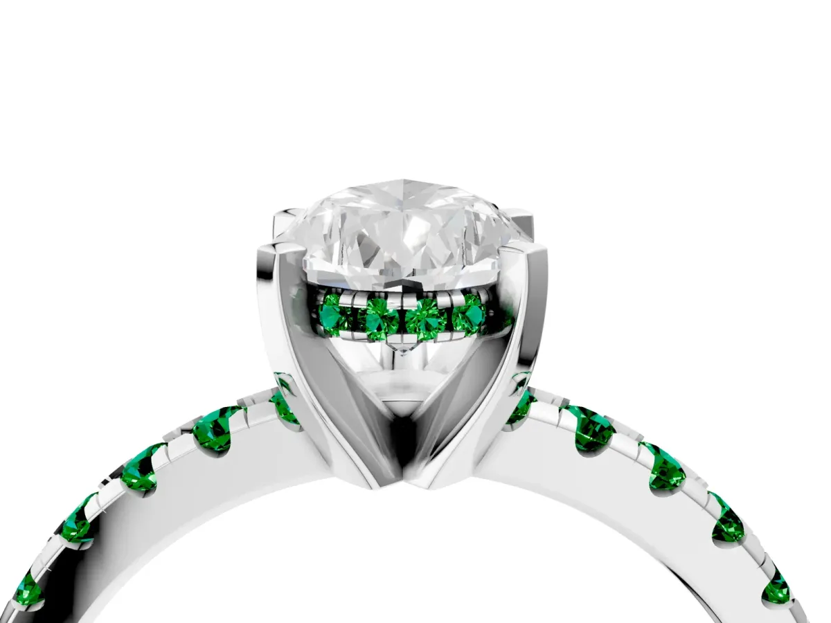 Pear Cut Diamond Solitaire Ring with Round Emerald Pavé Band and Four-Prong Setting Silver