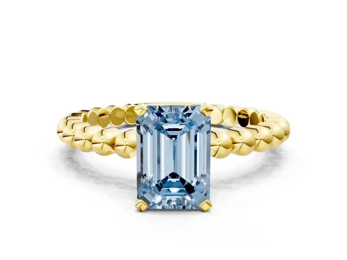 Fancy Blue Emerald Cut Diamond Solitaire Ring with Beaded Band and Prong Setting Yellow gold