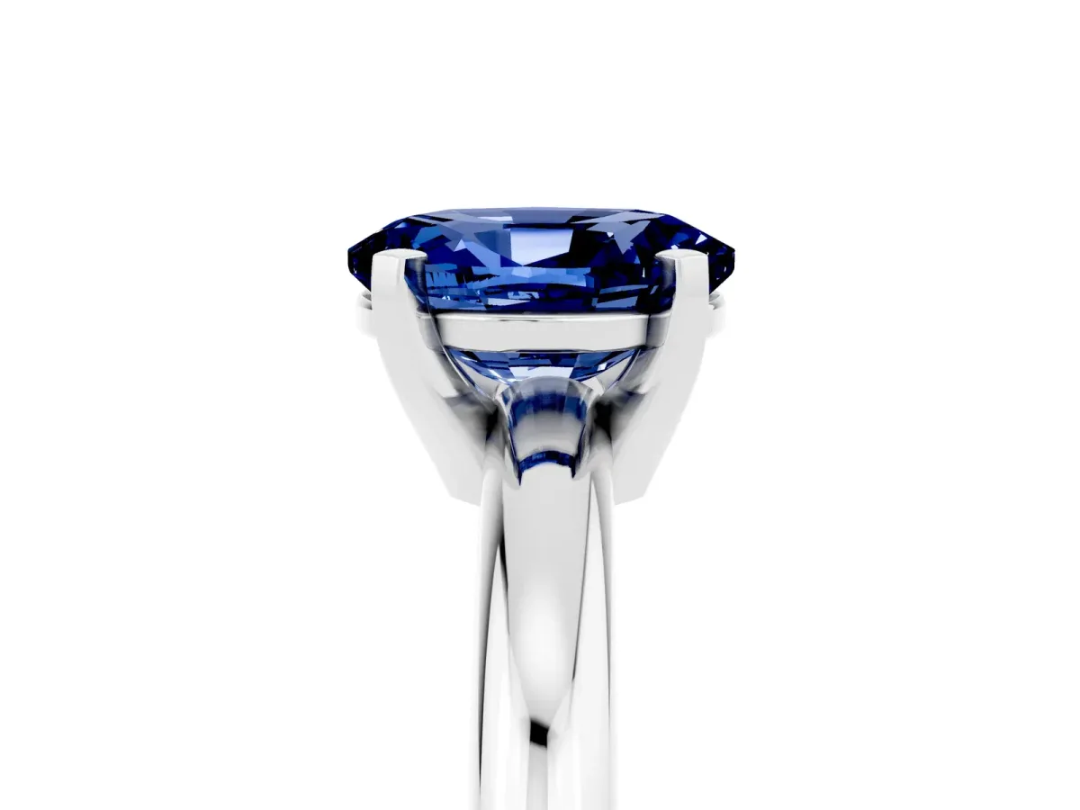 Oval Cut Blue Sapphire Solitaire Engagement Ring with Round Band and Four-Prong Setting Silver