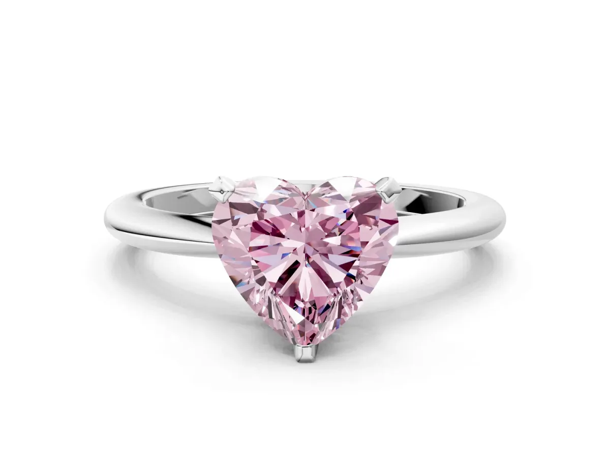 Fancy Pink Heart Cut Diamond Solitaire Ring with Six-Prong Setting and Classic Band Silver