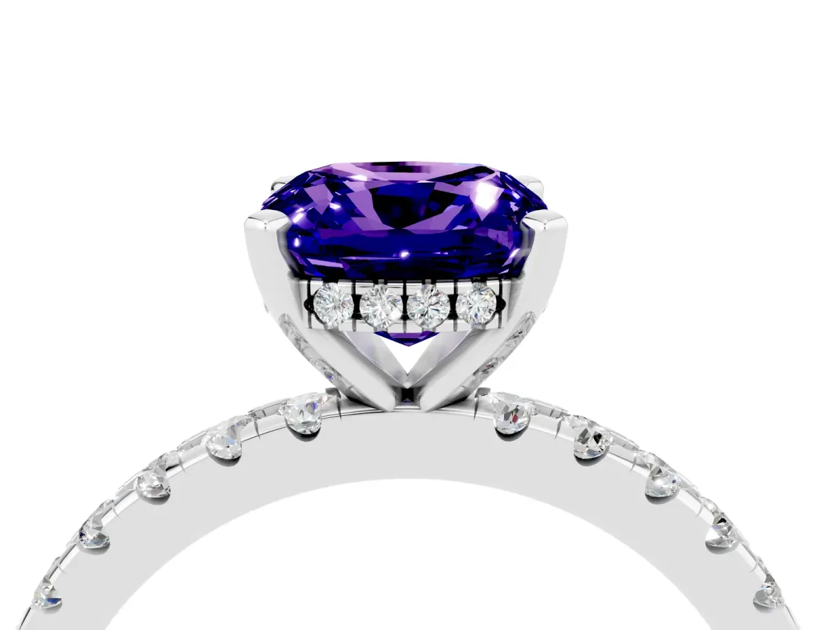 Cushion Cut Tanzanite Solitaire Ring with Round Pavé Band and Four-Prong Setting Silver