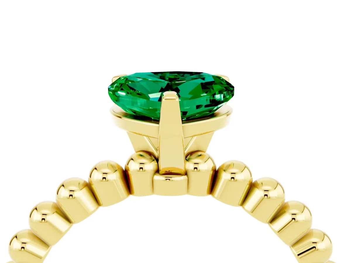 Heart Cut Emerald Solitaire Ring with Beaded Band and Prong Setting Yellow gold