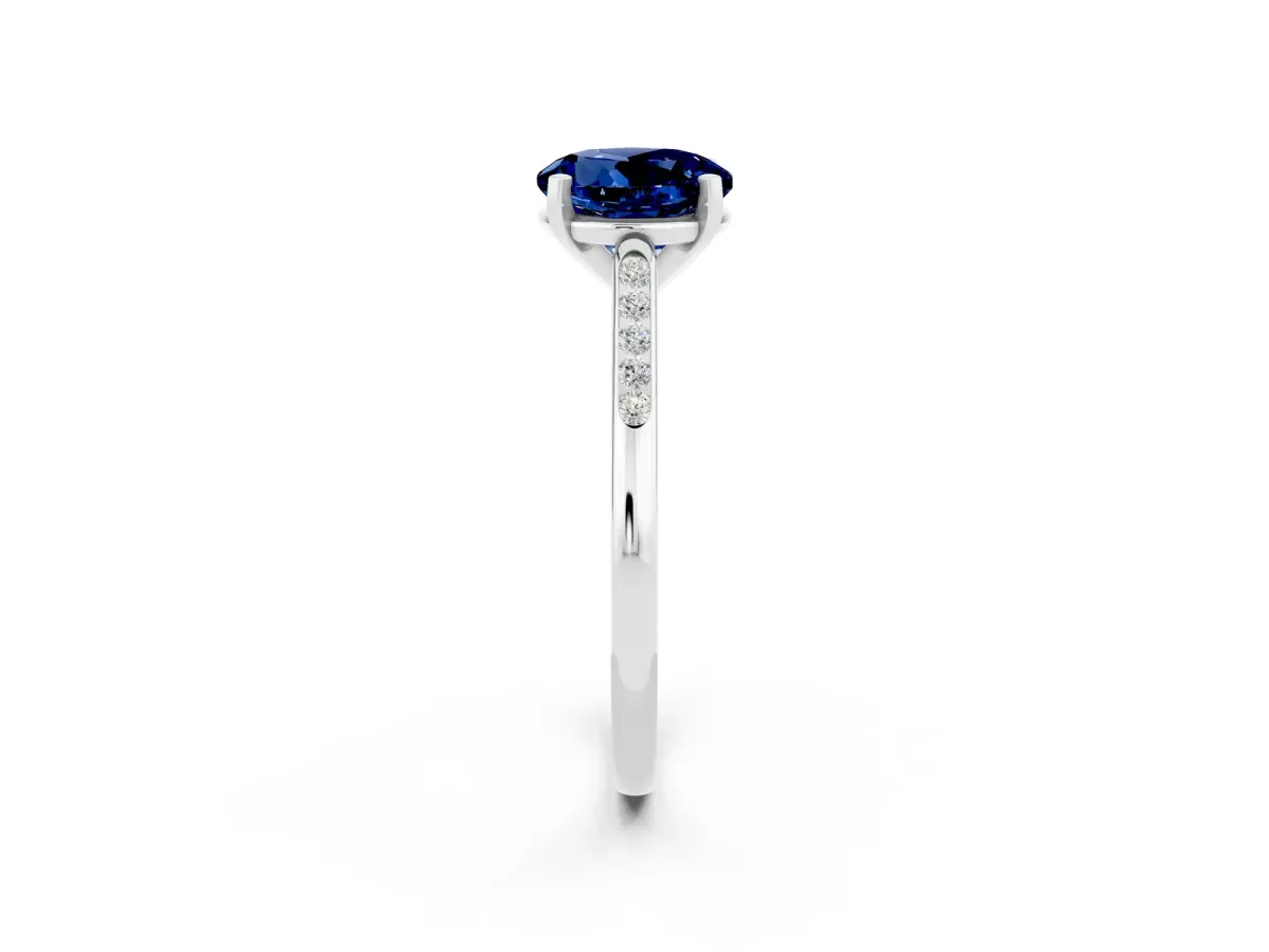 Round Cut Blue Sapphire Solitaire Ring with Channel Set Round Band and Prong Setting Silver