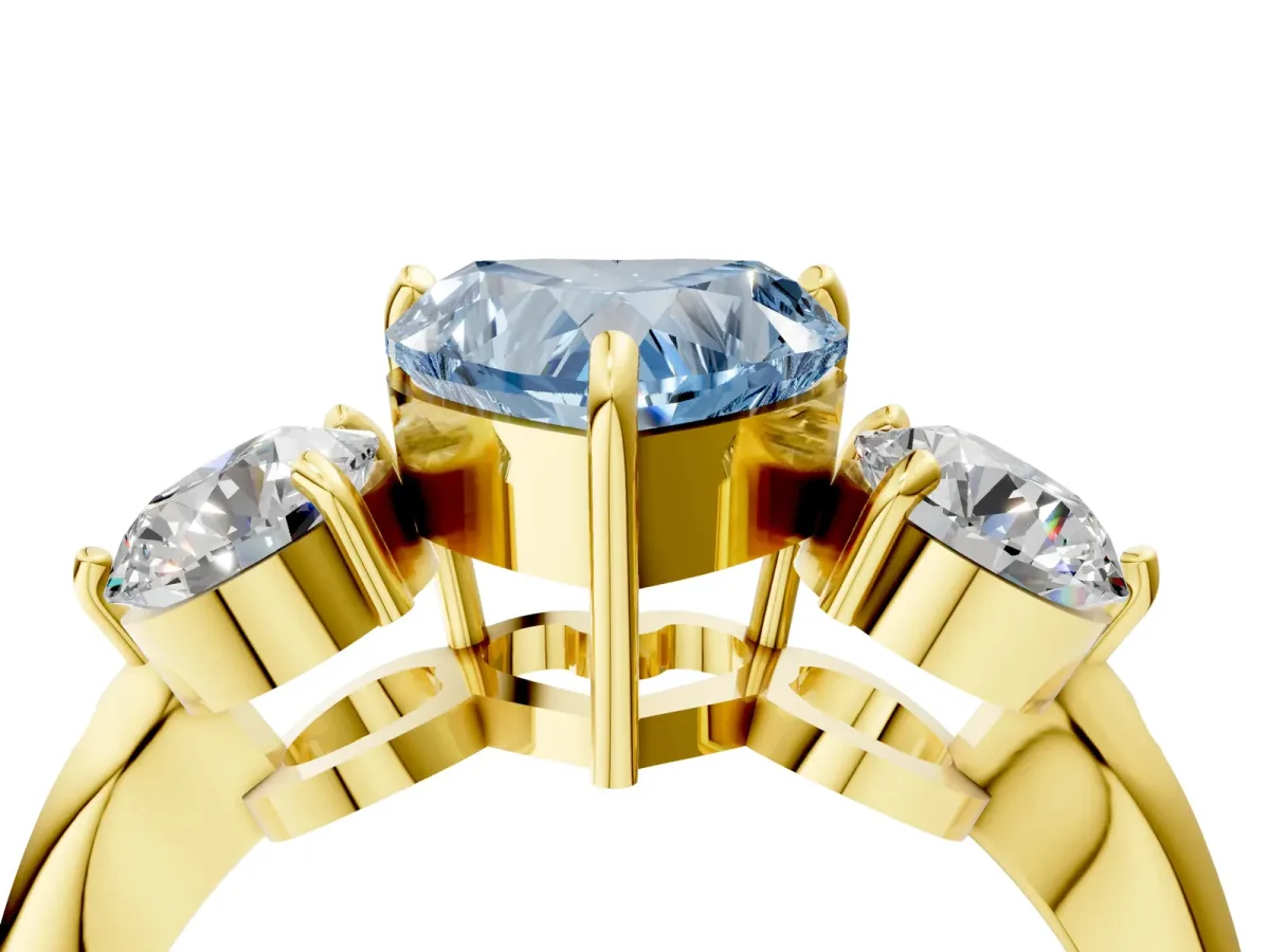 Fancy Blue Three-Stone Heart Cut Diamond Channel Set Engagement Ring with Prong Setting Yellow gold